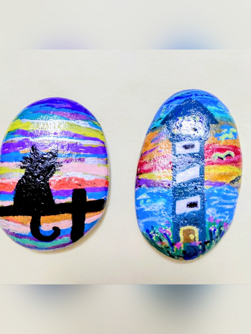 Hand painted on rocks Light House And Cat In The  Sunset  Aprox 4x3"